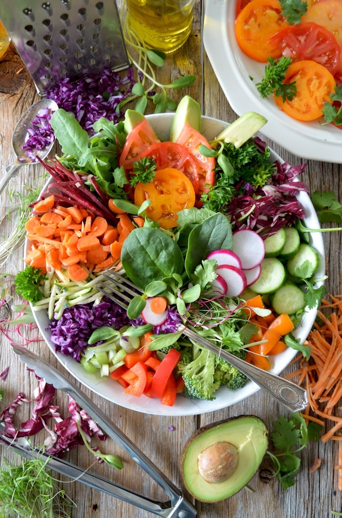 Anti-inflammatory whole foods and vibrant produce on a clean surface